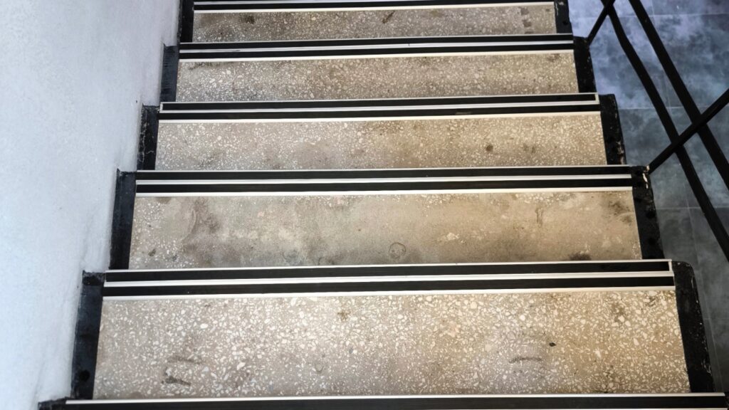 Concrete stairs with black and white safety strips